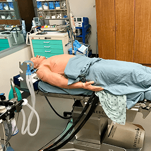 medical dummy on a operating table in simulation lab