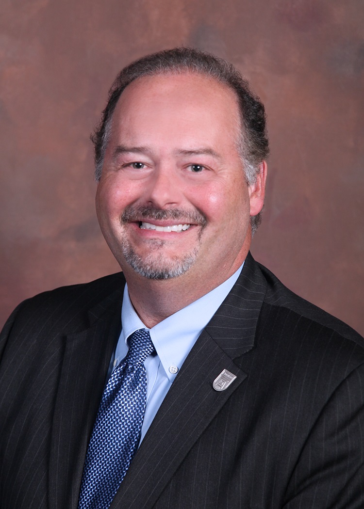 photo of Dr. Phillip Coule, MD, MBA, FACEP