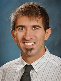 Headshot of Dustin Cox